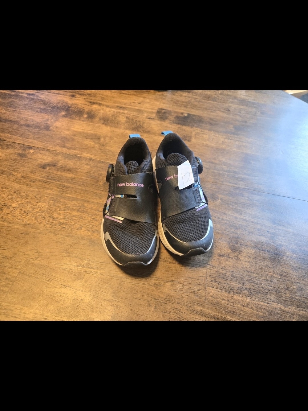 New Balance Kids Black Sneakers with Pink Accents